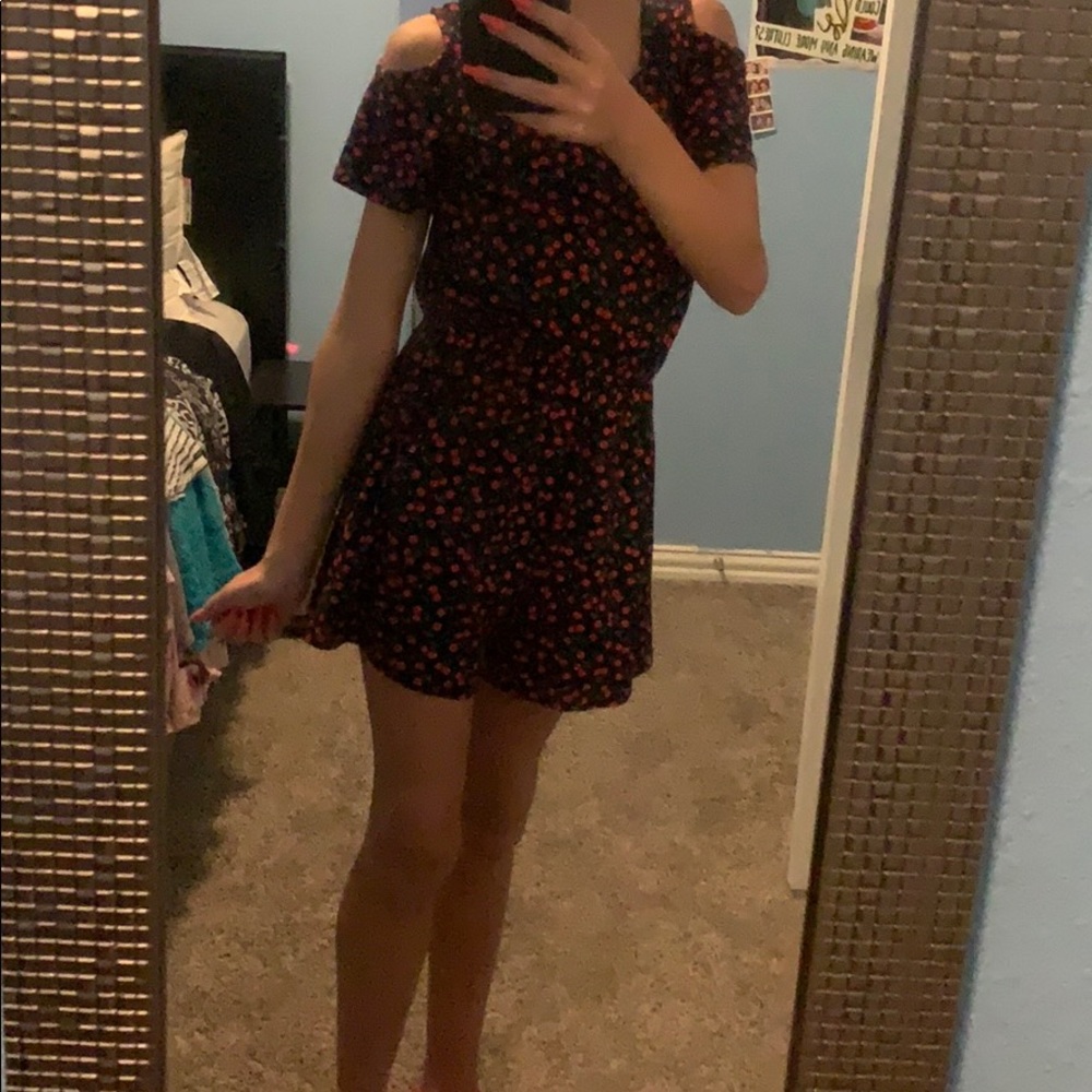 A red and black romper.